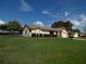Single Gathering home with a well manicured front lawn and driveway at 2235 Emperor Dr, Kissimmee, FL 34744