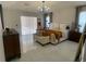 Bright and airy main bedroom features a king bed, elegant furnishings and a sliding glass door at 24 Cordona Dr, Kissimmee, FL 34758