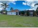 The screened-in pool area offers a private retreat with lush landscaping and ample space at 24 Cordona Dr, Kissimmee, FL 34758