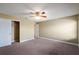 Bedroom with ceiling fan and large closet at 2412 Country Pond Ct, St Cloud, FL 34771