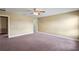 Bright bedroom with neutral walls, carpet, and ceiling fan at 2412 Country Pond Ct, St Cloud, FL 34771