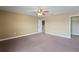 Bedroom featuring neutral colored walls and plush carpeting at 2412 Country Pond Ct, St Cloud, FL 34771