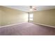 Bedroom featuring a ceiling fan and natural light from the window at 2412 Country Pond Ct, St Cloud, FL 34771