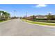 View of the Blackstone community entrance with an American flag and manicured landscaping at 2412 Country Pond Ct, St Cloud, FL 34771
