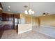 Modern kitchen features a functional island layout and stainless steel appliances at 2412 Country Pond Ct, St Cloud, FL 34771