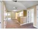 Carpeted upstairs loft area featuring multiple doorways leading to other rooms at 2412 Country Pond Ct, St Cloud, FL 34771