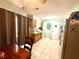 Traditional kitchen with wood cabinets and a tile backsplash plus adjacent dining area with breakfast table set at 268 Florida Pkwy, Kissimmee, FL 34743