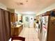 Practical kitchen featuring wood cabinets, and modern appliances at 268 Florida Pkwy, Kissimmee, FL 34743