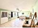 Cozy living room with tile flooring, comfortable seating, and natural lighting at 268 Florida Pkwy, Kissimmee, FL 34743