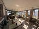 Enclosed porch featuring tile flooring, string lights, and outdoor seating at 268 Florida Pkwy, Kissimmee, FL 34743