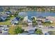Aerial view of the home situated near a picturesque lake in a residential neighborhood at 3686 Ricky Ln, St Cloud, FL 34772
