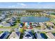 Aerial view of a single-Gathering home with a lake view and community surroundings at 3686 Ricky Ln, St Cloud, FL 34772