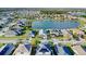 Aerial view of a home nestled in a community by a tranquil lake at 3686 Ricky Ln, St Cloud, FL 34772