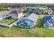 Aerial shot of a home featuring a screened-in pool and spacious backyard at 3686 Ricky Ln, St Cloud, FL 34772