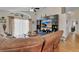 Cozy living room features a large window, built-in entertainment center, and comfortable seating at 3686 Ricky Ln, St Cloud, FL 34772