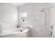 Bright bathroom showcasing a soaking tub, chrome fixtures and elegant marble tiled shower at 4301 Presidio Way, Kissimmee, FL 34746