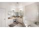 Elegant bathroom with double vanity, marble countertops, soaking tub, and modern fixtures at 4301 Presidio Way, Kissimmee, FL 34746
