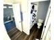 bathroom with patterned walls and a Mickey Mouse shower curtain at 4301 Presidio Way, Kissimmee, FL 34746