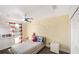 Bright bedroom featuring playful decor and a ceiling fan at 4301 Presidio Way, Kissimmee, FL 34746