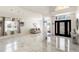 Open-concept foyer with elegant marble flooring and bright natural light at 4301 Presidio Way, Kissimmee, FL 34746