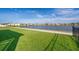 Spacious backyard featuring a serene lake view, perfect for relaxation and outdoor activities at 4479 Blue Rock Dr, Sanford, FL 32771