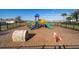 Community playground with modern equipment at 4479 Blue Rock Dr, Sanford, FL 32771