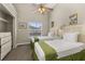 Bright bedroom with twin beds, closet, and natural light at 4614 Falcon Ave, Kissimmee, FL 34746