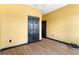 Empty bedroom with laminate flooring and a large closet at 486 Lake Shore Pkwy, Davenport, FL 33896
