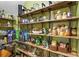 Well-stocked pantry featuring custom wood shelving and a variety of organized food items and kitchen essentials at 486 Lake Shore Pkwy, Davenport, FL 33896