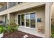 Outdoor patio featuring view of the lake and an outdoor hose hookup at 486 Lake Shore Pkwy, Davenport, FL 33896