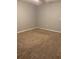 The bedroom offers neutral carpeting and paint, creating a serene atmosphere at 49 Inconnu Dr, Poinciana, FL 34759