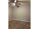 Bedroom featuring a ceiling fan and neutral wall color at 49 Inconnu Dr, Poinciana, FL 34759