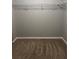 An open closet provides practical storage solutions at 49 Inconnu Dr, Poinciana, FL 34759
