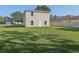 Large backyard area perfect for outdoor activities or relaxation with rear door and two-story construction at 49 Inconnu Dr, Poinciana, FL 34759