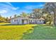 Charming one-story home with a well-maintained front yard and freshly painted exterior at 495 Orange Ave, St Cloud, FL 34769