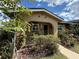 Charming single-story home featuring a landscaped front yard with inviting curb appeal and a cozy front porch at 502 Polaris Loop # 110, Casselberry, FL 32707
