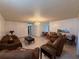 Open-concept living area with tile flooring seamlessly connecting living room and dining space at 502 Polaris Loop # 110, Casselberry, FL 32707