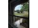 Backyard view seen through window at 502 Polaris Loop # 110, Casselberry, FL 32707