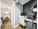 Cozy home office next to bedroom featuring a modern desk setup at 521 Florida Ave, St Cloud, FL 34769