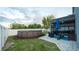 Backyard features a fenced yard, above ground pool and covered patio with comfortable seating at 5640 Silver Thistle Ln, St Cloud, FL 34772