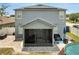 Stunning home exterior featuring a screened-in porch and backyard with a pool at 5640 Silver Thistle Ln, St Cloud, FL 34772