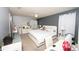 Comfortable primary bedroom with plush carpeting, neutral walls, and a ceiling fan at 5640 Silver Thistle Ln, St Cloud, FL 34772