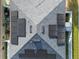 Aerial view showcases a home's roof equipped with modern solar panels for energy efficiency at 5640 Silver Thistle Ln, St Cloud, FL 34772