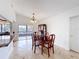 Bright dining area adjacent to the kitchen, perfect for Gathering meals at 707 Divot Ln, Poinciana, FL 34759