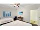 Bedroom featuring two beds, a window and a small desk at 7602 Cabana Ct # 101, Reunion, FL 34747