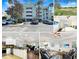 Collage showcasing the building exterior, bedroom, kitchen, and living room of the property at 7602 Cabana Ct # 101, Reunion, FL 34747