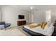Spacious bedroom with light walls, stylish furnishing, and soft natural light at 7649 Wilmington Loop, Kissimmee, FL 34747