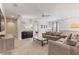 Bright living room with bar, entertainment center and comfortable seating for guests at 7649 Wilmington Loop, Kissimmee, FL 34747