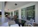 Spacious covered patio area featuring an outdoor grill and view of the lovely pool and backyard at 7649 Wilmington Loop, Kissimmee, FL 34747