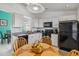 Bright kitchen with stainless steel appliances and granite countertops at 7706 Water Oak Ct, Kissimmee, FL 34747
